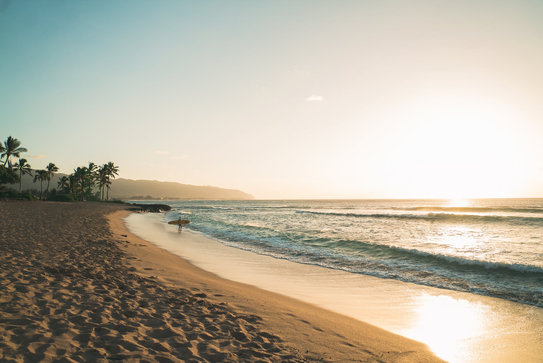 photo of beach during dawn